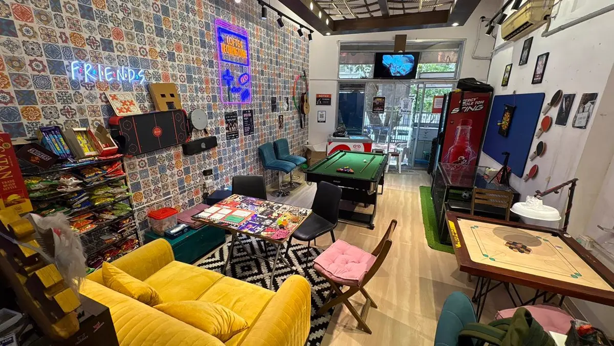 Loft 64 pool table and neon Friend Zone lounge